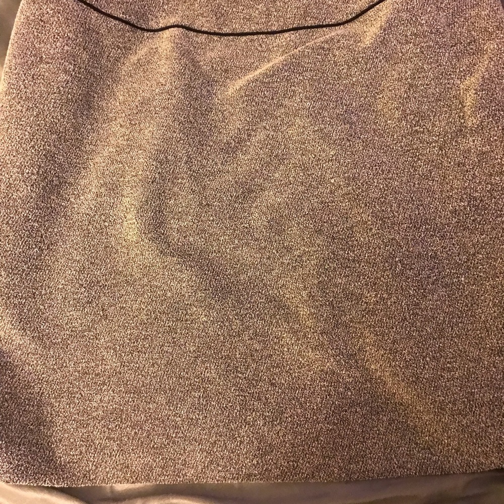Black and cream skirt, made by Kasper, 26.5 inches long, short split in the back